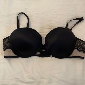 Nude and Black lace bra